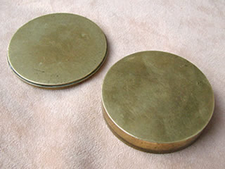 View of lid & underside of brass case
